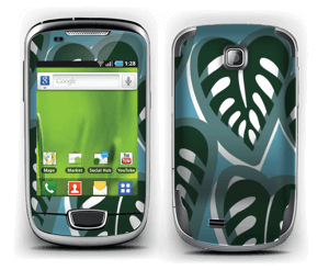 A tropical skin in the beautiful colours dusty turquoise and deep green for your laptop.